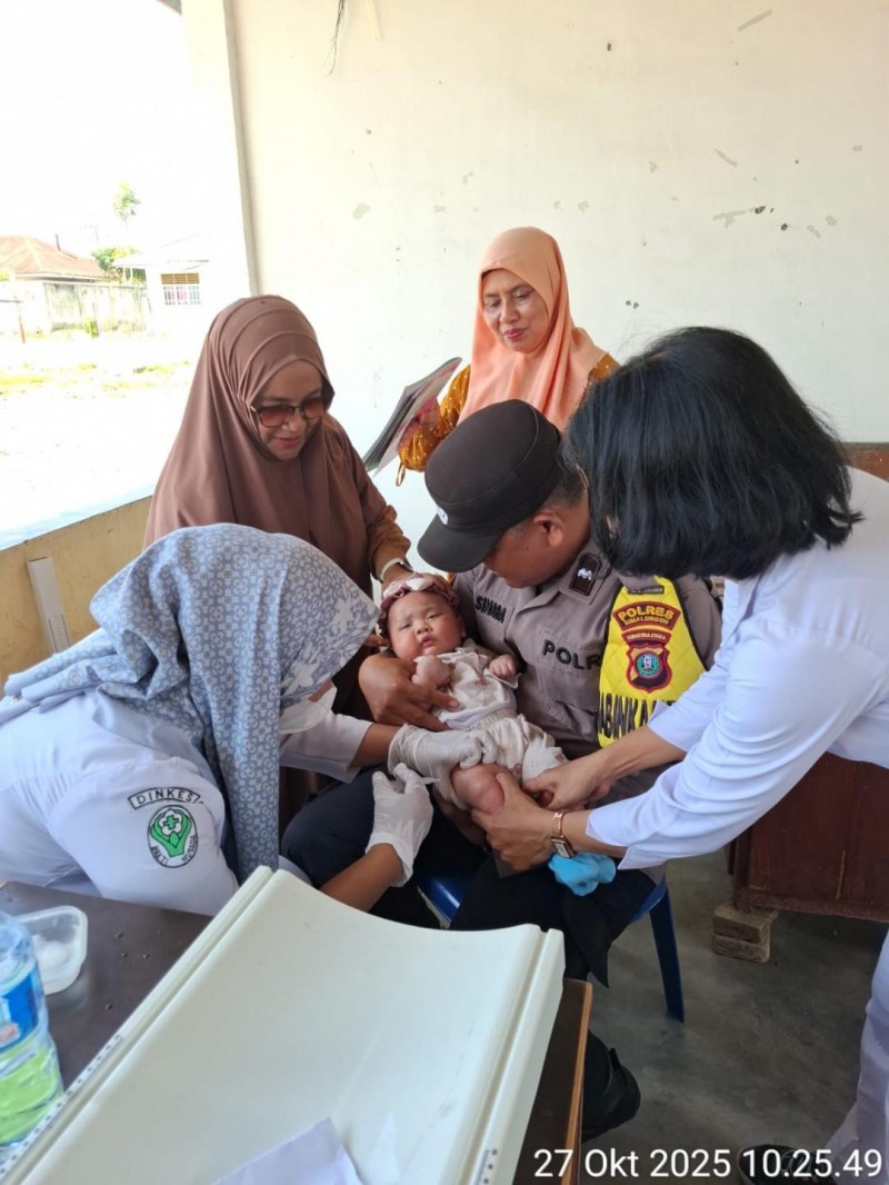 Bhabinkamtibmas Aipda H. Sinaga Dampingi Kegiatan &ldquo;PENARI&rdquo; di Bosar Maligas: Dukung Imunisasi Balita Demi Generasi Sehat