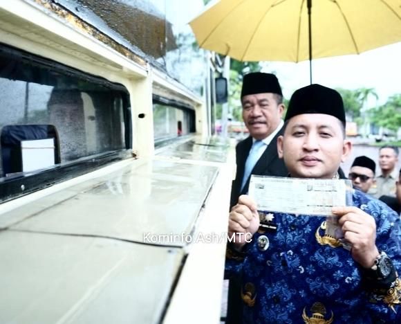 Bupati Asahan Tegaskan Wajib Hukumnya Kendaraan Dinas Dibayar Pajaknya