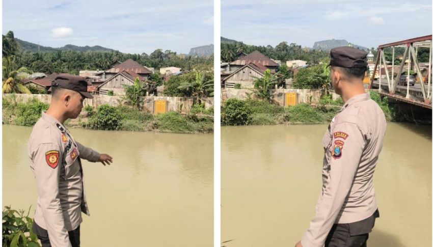 Antisipasi Perubahan Cuaca, Polsek Aek Natas Lakukan Pengecekan Debit Air Sungai Bandar