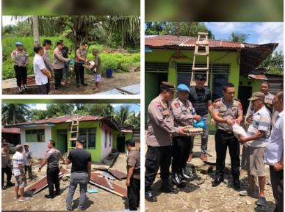 Polsek Nasembilan-sepuluh  Salurkan Bantuan dan Gelar Bakti Sosial untuk Warga Terdampak Bencana Angin Kencang di Desa Pulo Jantan