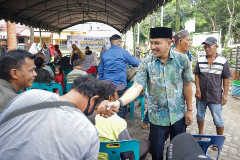 WalikotaTebingtinggi Tinjau Penyaluran Bantuan Beras Tahap Pertama