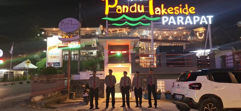 Aiptu Roland Manik, Sosok Personel Pam Obvit Ceria yang Jaga Kenyamanan Wisatawan di Parapat Saat Malam Minggu